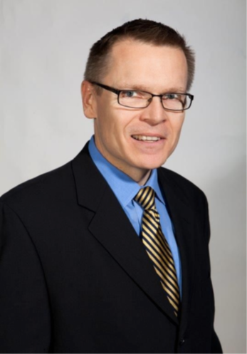 Headshot of James Brady